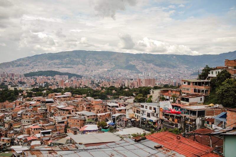 Colorful urban landscape of Medellín Colombia showing rooftops and mountain valley