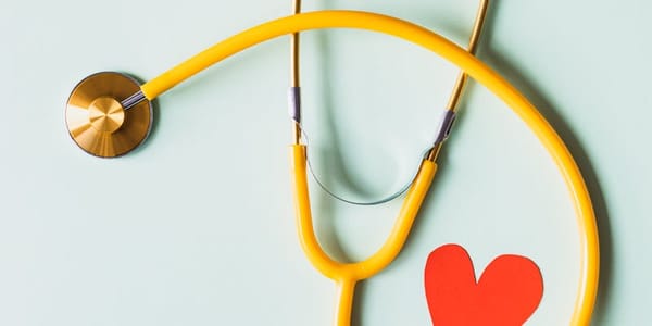 Doctor consulting with patient in a modern Colombian healthcare clinic